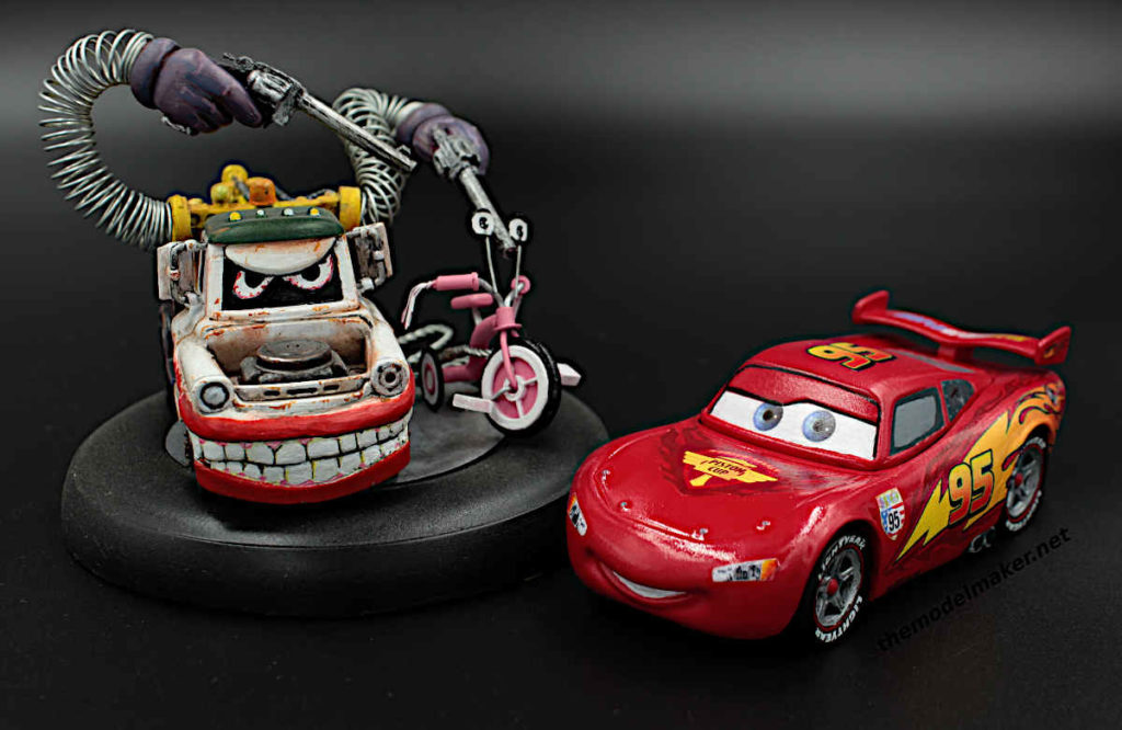 Cars Lightning McQueen custom engagement ring box and Mater custom Joker figure