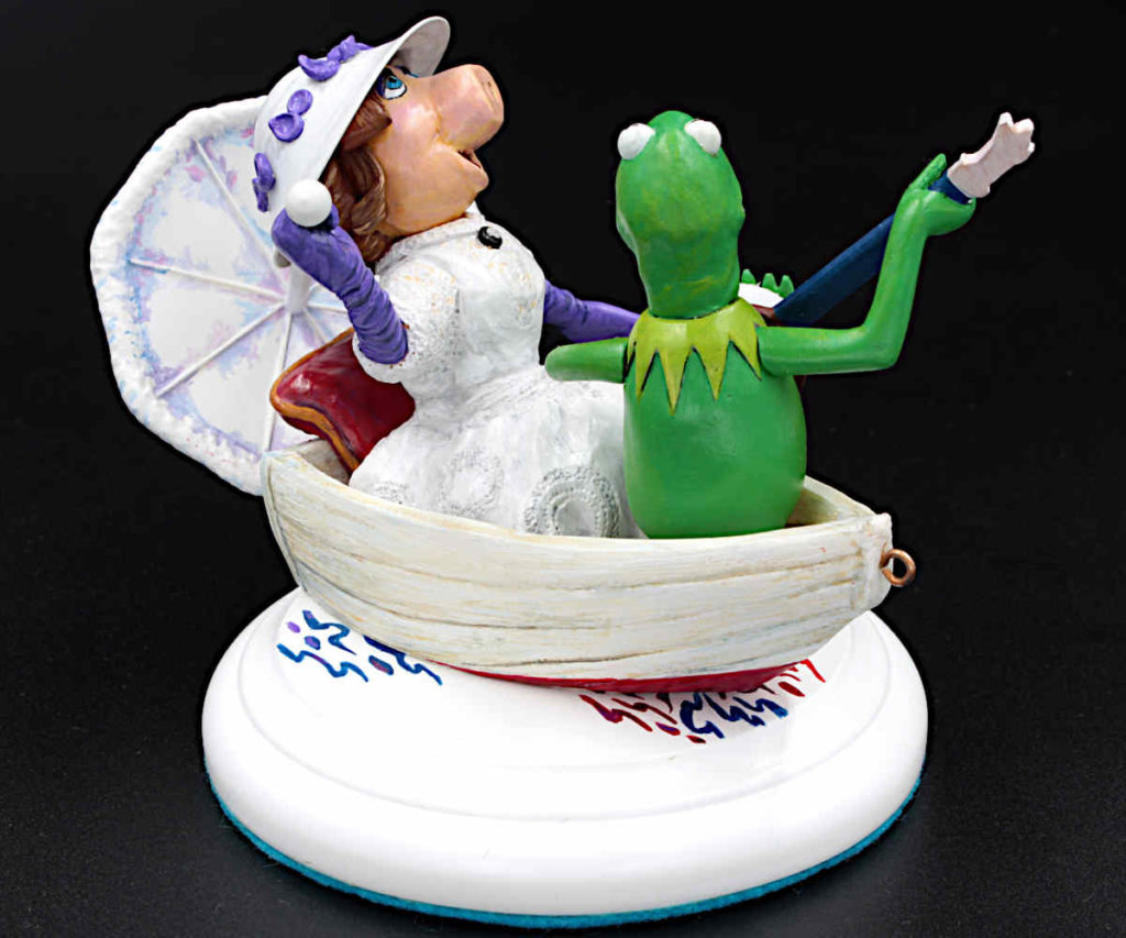 Kermit the frog singing to Miss Piggy puppets on the boat recreated as custom engagement ring box hand sculpted figure for Muppets Show fans